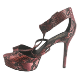 Candie's red snakeskin platforms